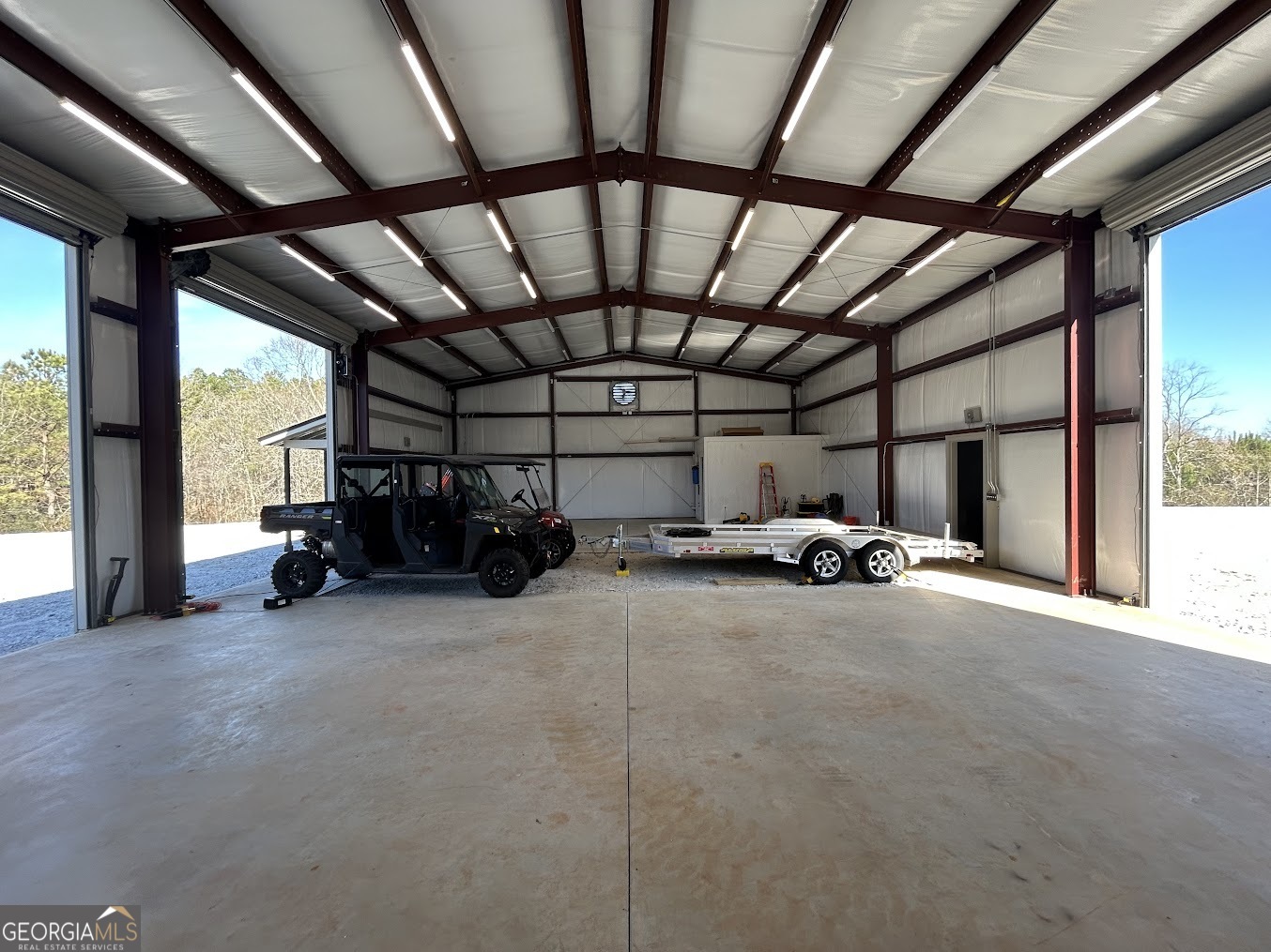 85 Blackjack Mountain Road Bowdon, GA 30108 - Photo 5 of 32 a view of car garage