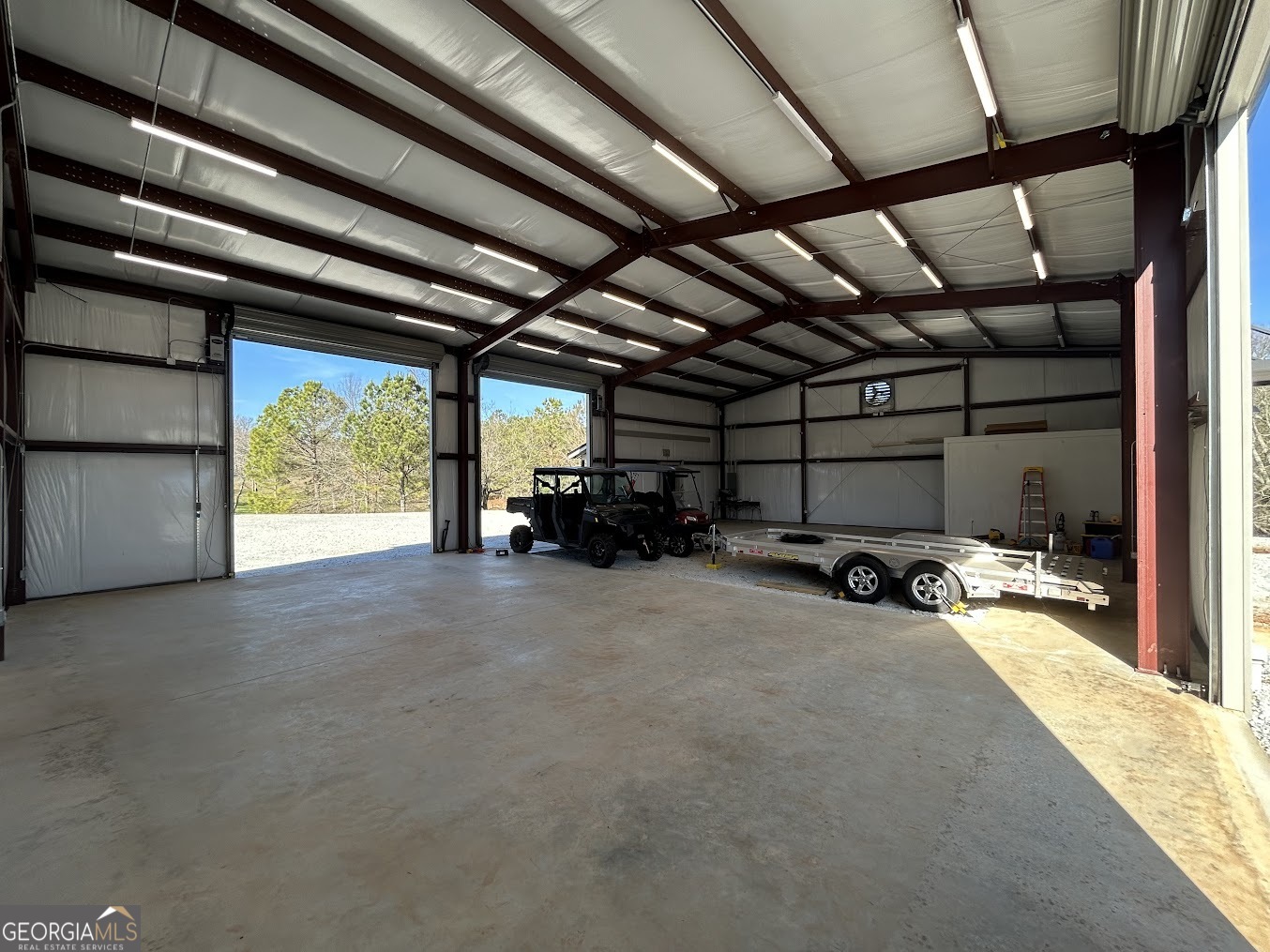 85 Blackjack Mountain Road Bowdon, GA 30108 - Photo 6 of 32 a view of a room with gym equipment