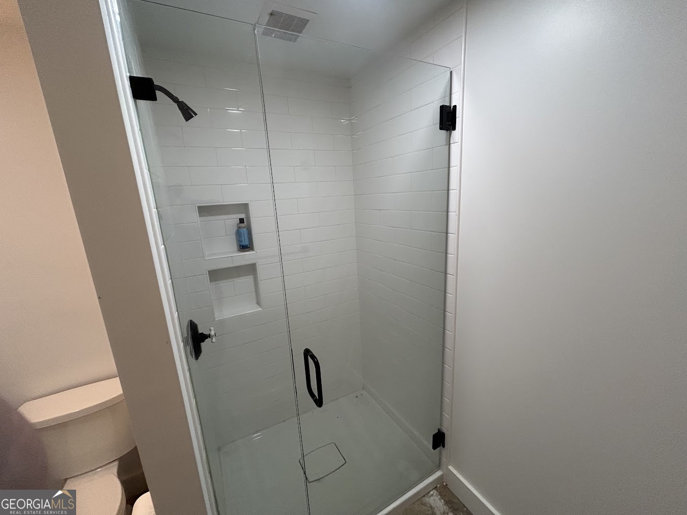 85 Blackjack Mountain Road Bowdon, GA 30108 - Photo 9 of 32 a bathroom with a shower