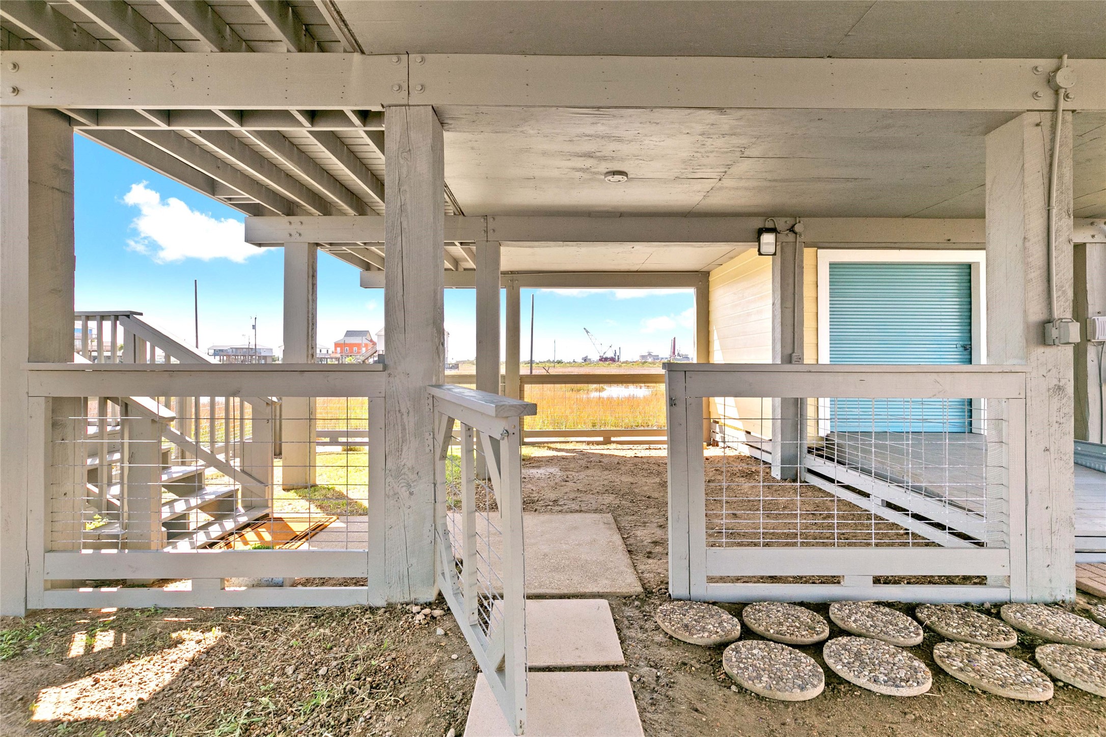 715 Caisson Street Surfside Beach, TX 77541 - Photo 27 of 35 Fenced area downstairs is perfect for pets!