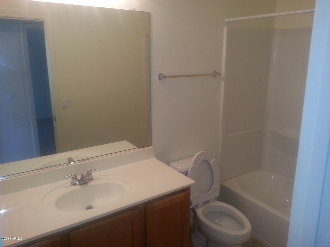 44395 Cypress Lane Maricopa, AZ 85138 - Photo 15 of 20 a bathroom with a sink a toilet and shower