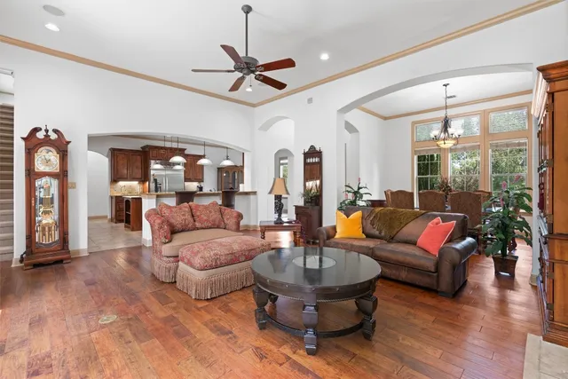 a kitchen with stainless steel appliances granite countertop a sink counter space cabinets and a stove