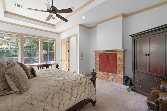 a bedroom with a bed and furniture