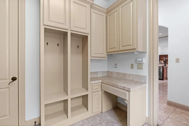 a utility room with sink dryer and washer