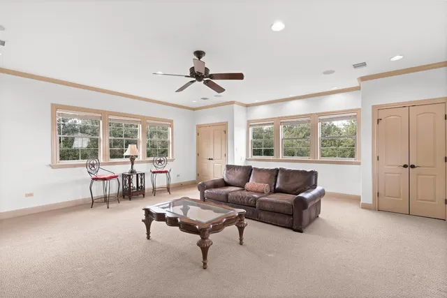a kitchen with white cabinets and a sink