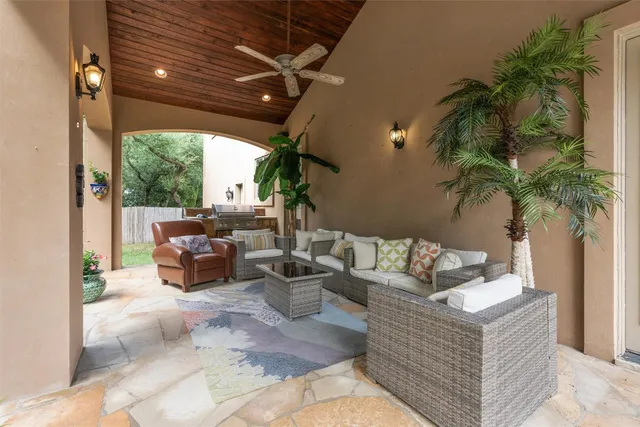 a bathroom with a double vanity sink mirror and bathtub