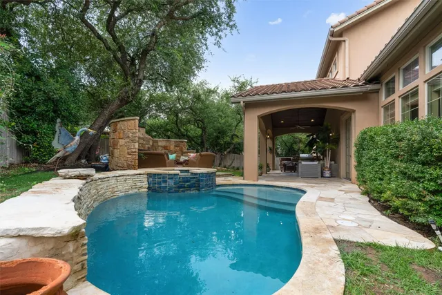 a outdoor living space with patio furniture and garden