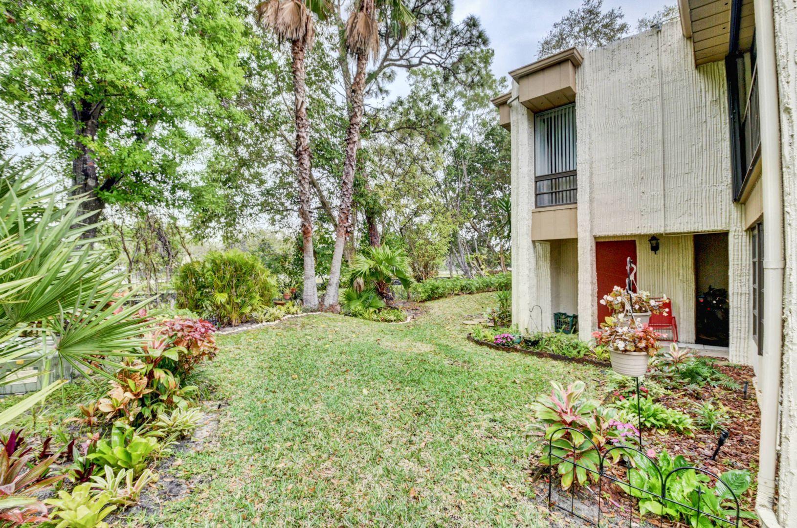 6621 Spring Bottom Way, Unit 142 Boca Raton, FL 33433 - Photo 24 of 26 Exterior Back