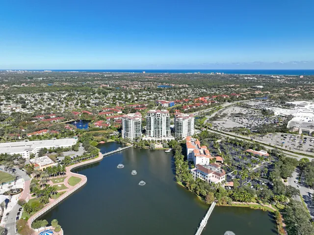a swimming pool with outdoor seating and yard