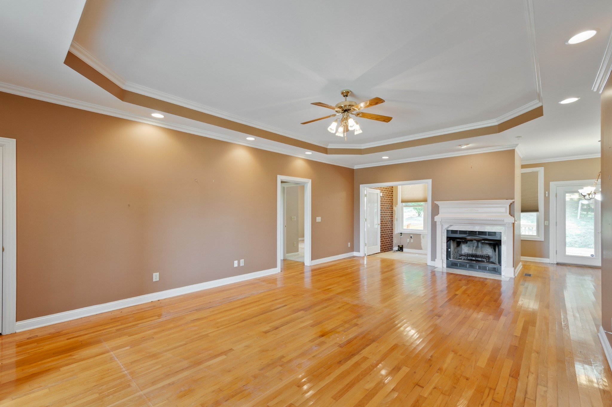 1741 Dean Road Thompson's Station, TN 37179 - Photo 12 of 54 a view of an empty room with a fireplace and a workspace