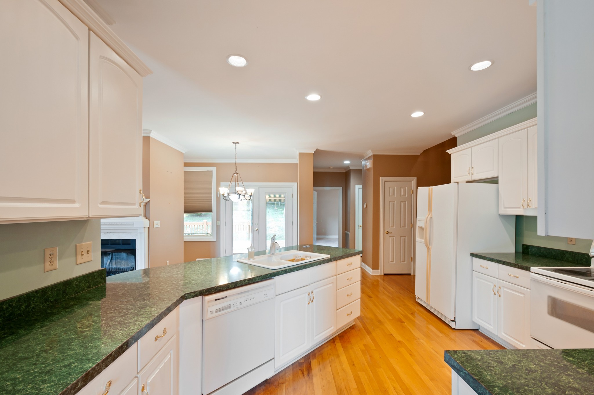 1741 Dean Road Thompson's Station, TN 37179 - Photo 21 of 54 a large kitchen with stainless steel appliances granite countertop a refrigerator and a sink