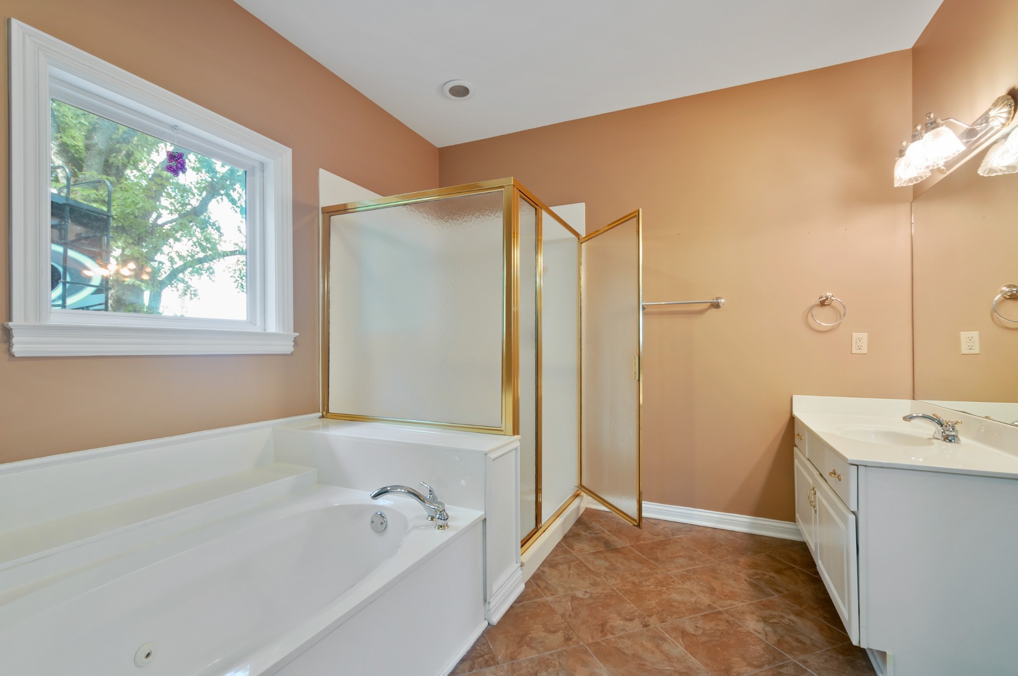 1741 Dean Road Thompson's Station, TN 37179 - Photo 34 of 54 a bathroom with a tub sink and mirror