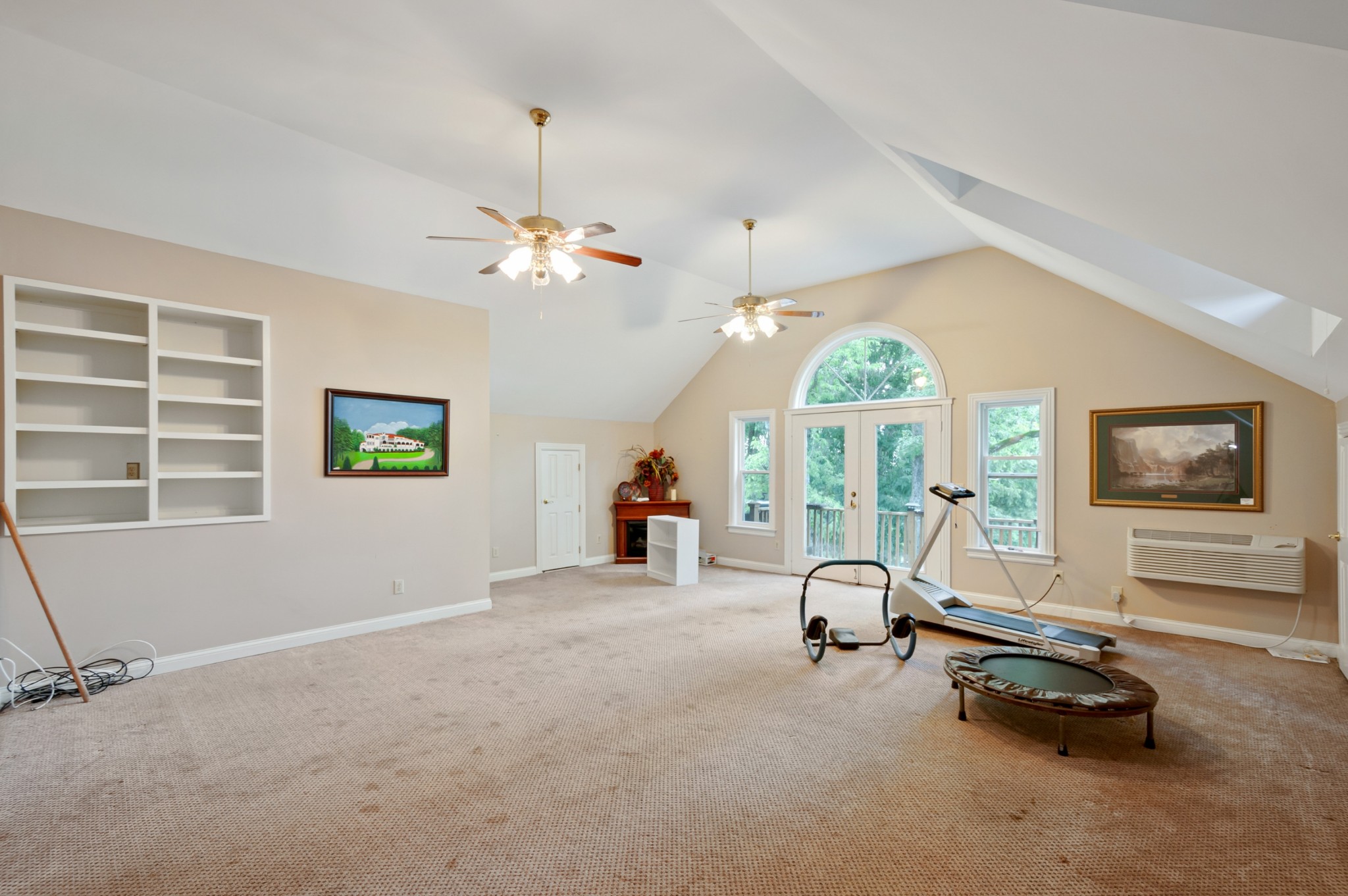 1741 Dean Road Thompson's Station, TN 37179 - Photo 35 of 54 a living room with furniture gym equipment and a large window