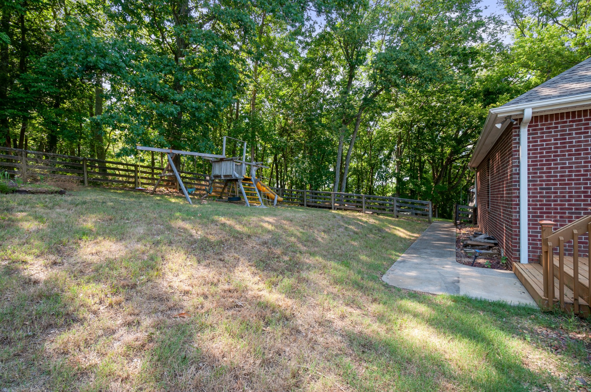1741 Dean Road Thompson's Station, TN 37179 - Photo 39 of 54 a view of a tennis ground with large trees