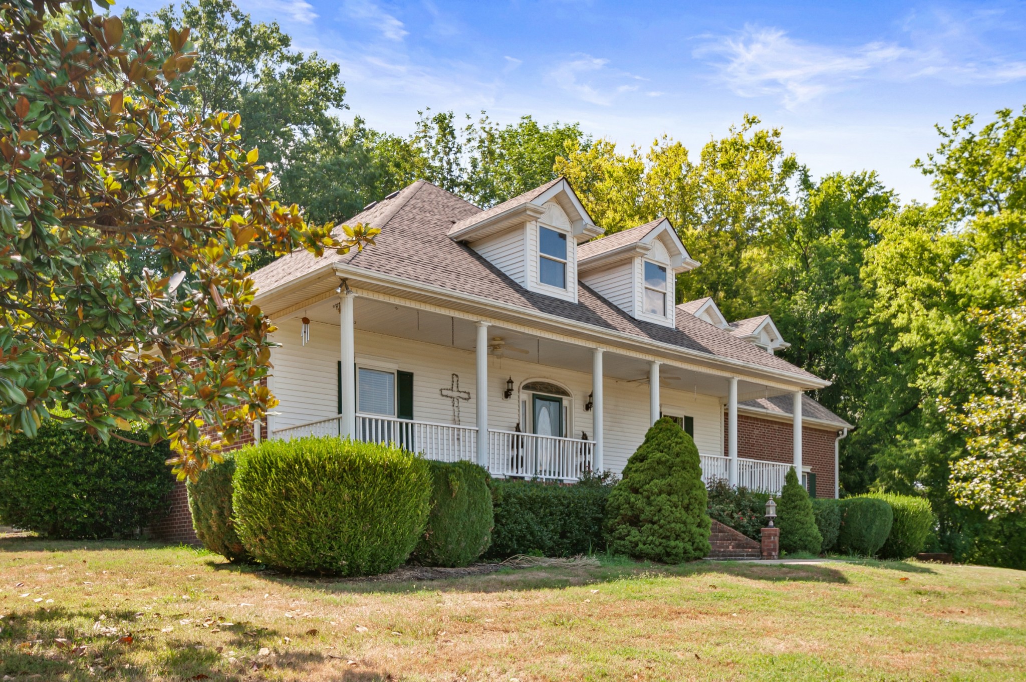 1741 Dean Road Thompson's Station, TN 37179 - Photo 5 of 54 a front view of a house with a garden