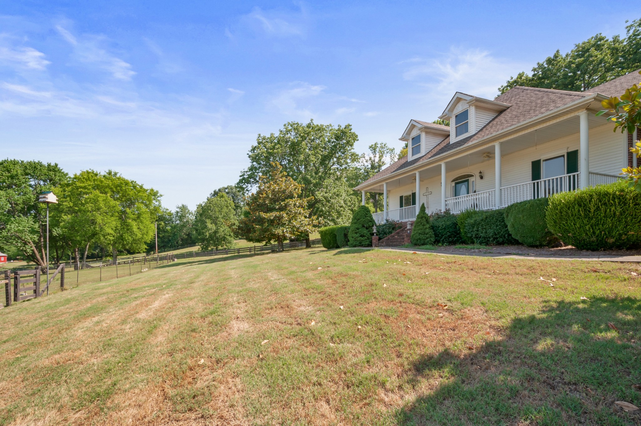 1741 Dean Road Thompson's Station, TN 37179 - Photo 6 of 54 a house with trees in the background