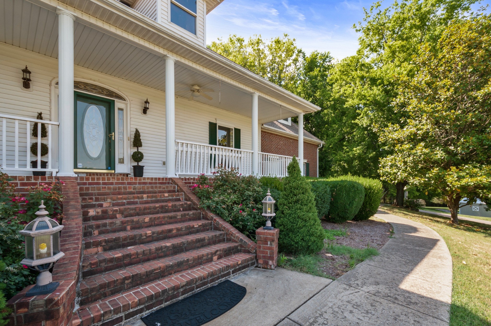 1741 Dean Road Thompson's Station, TN 37179 - Photo 7 of 54 a front view of a house with a yard