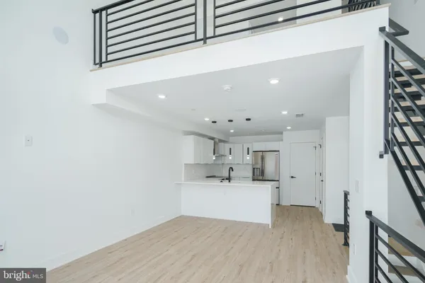 a view of kitchen with wooden floor