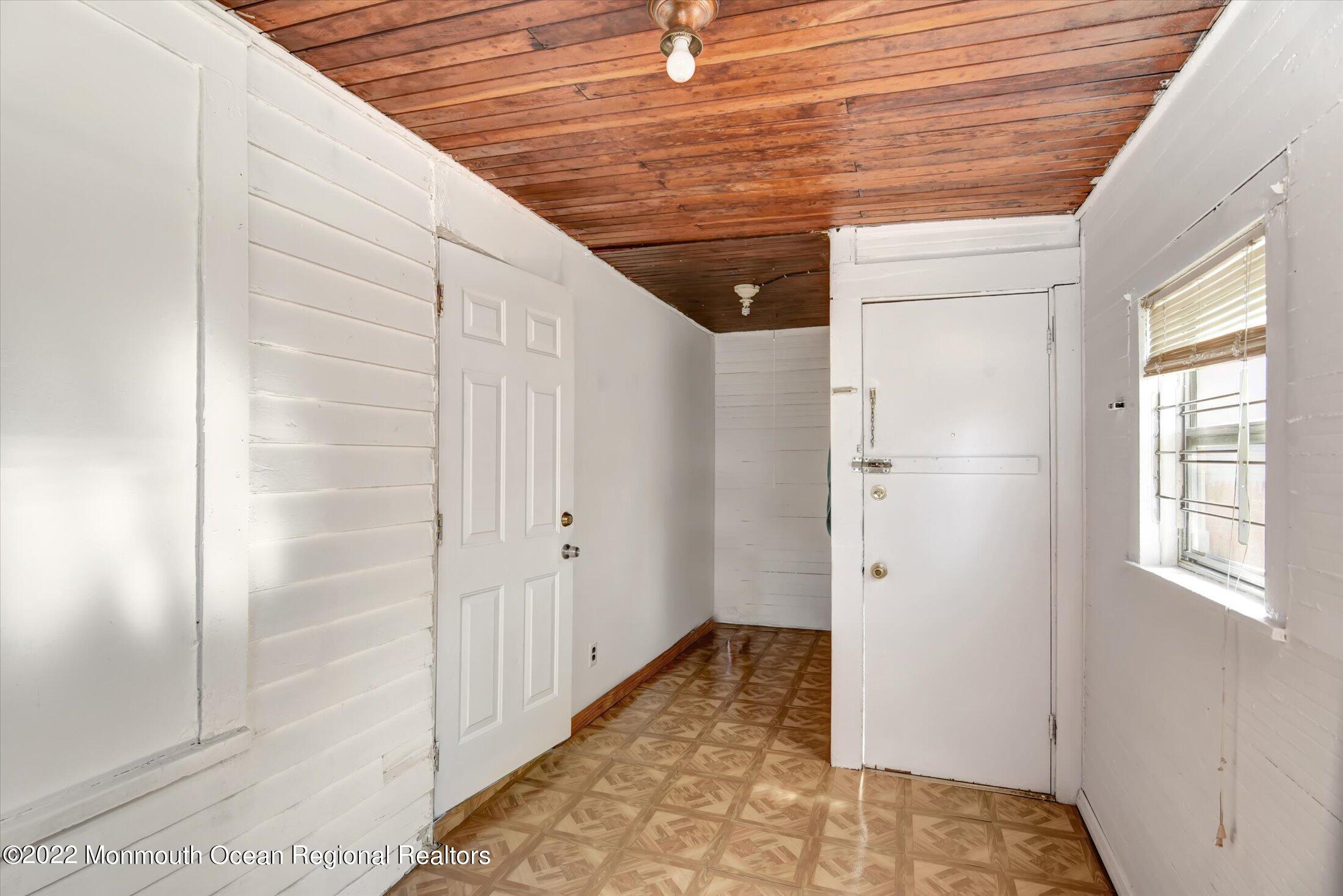 742 Old Road Elizabeth, NJ 07202 - Photo 16 of 25 a view of hallway with closet and wooden floor