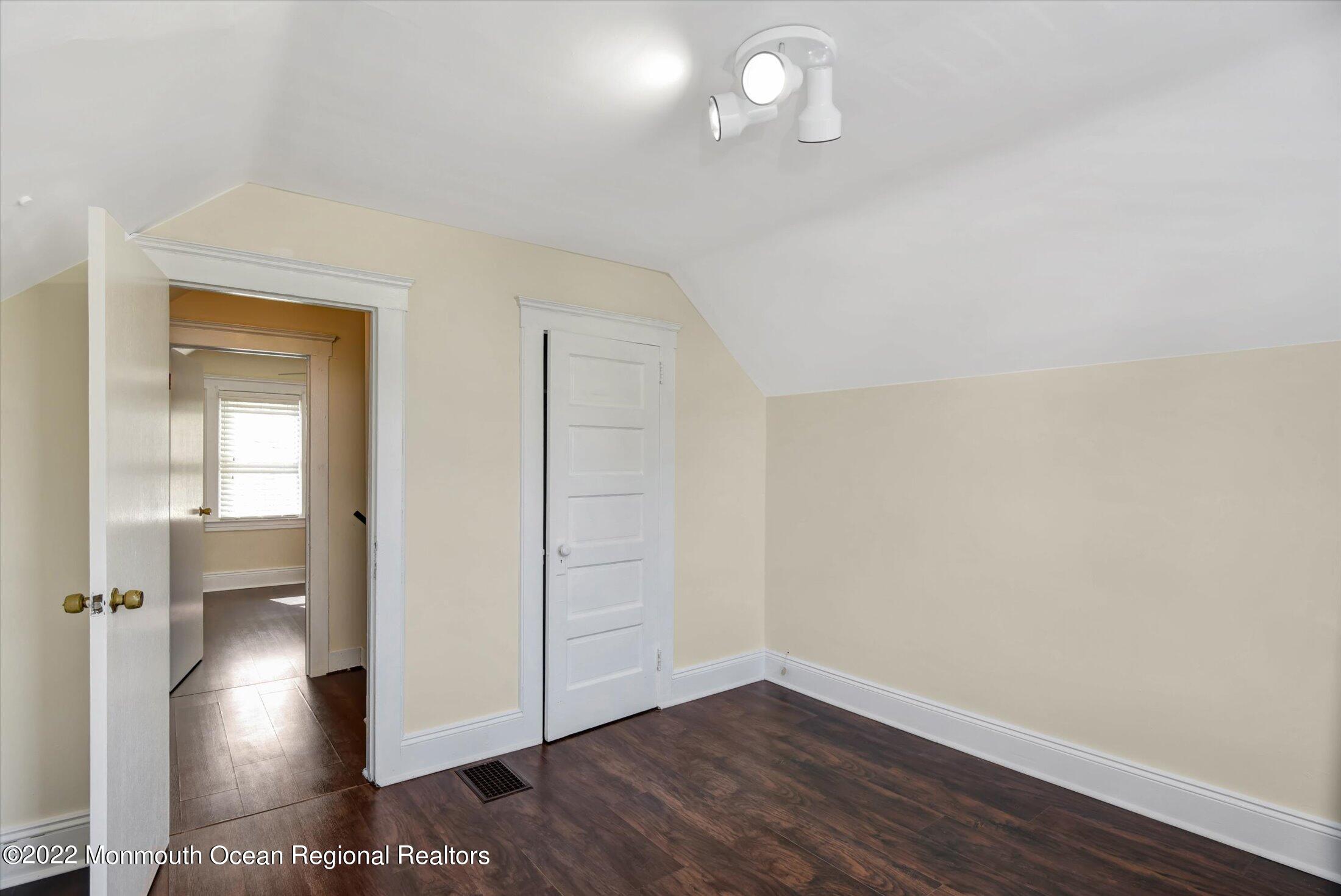 742 Old Road Elizabeth, NJ 07202 - Photo 18 of 25 wooden floor in an empty room