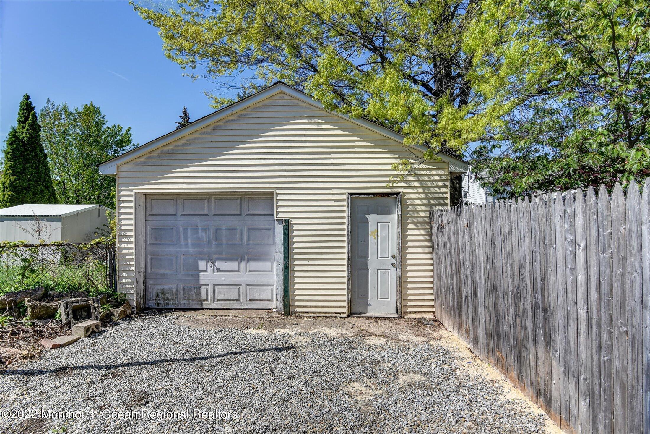742 Old Road Elizabeth, NJ 07202 - Photo 25 of 25 a front view of a house with a garage