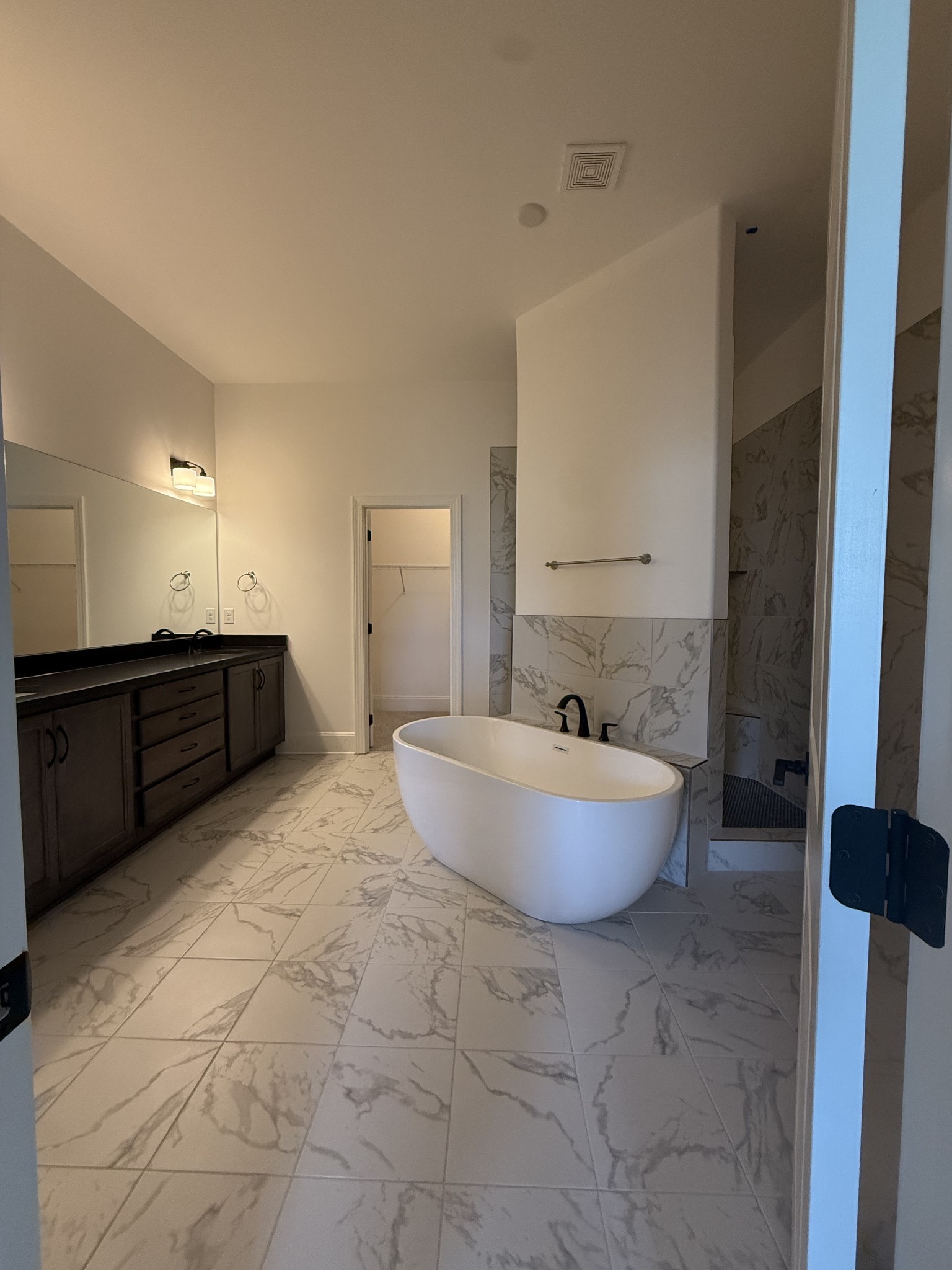 2115 Harkreader Road Mount Juliet, TN 37122 - Photo 14 of 21 a spacious bathroom with a tub sink and a mirror