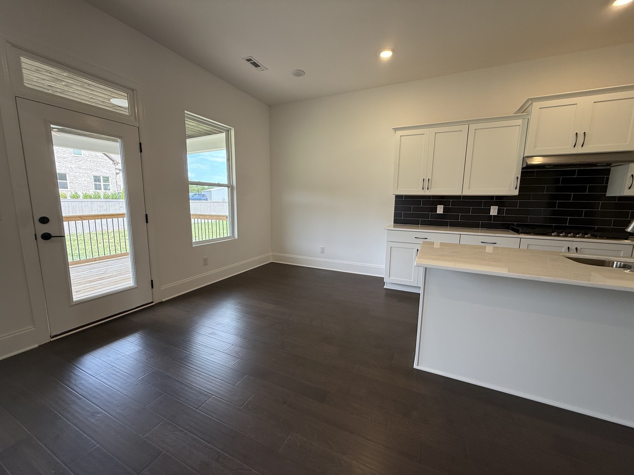 2115 Harkreader Road Mount Juliet, TN 37122 - Photo 16 of 21 an empty room with wooden floor and windows