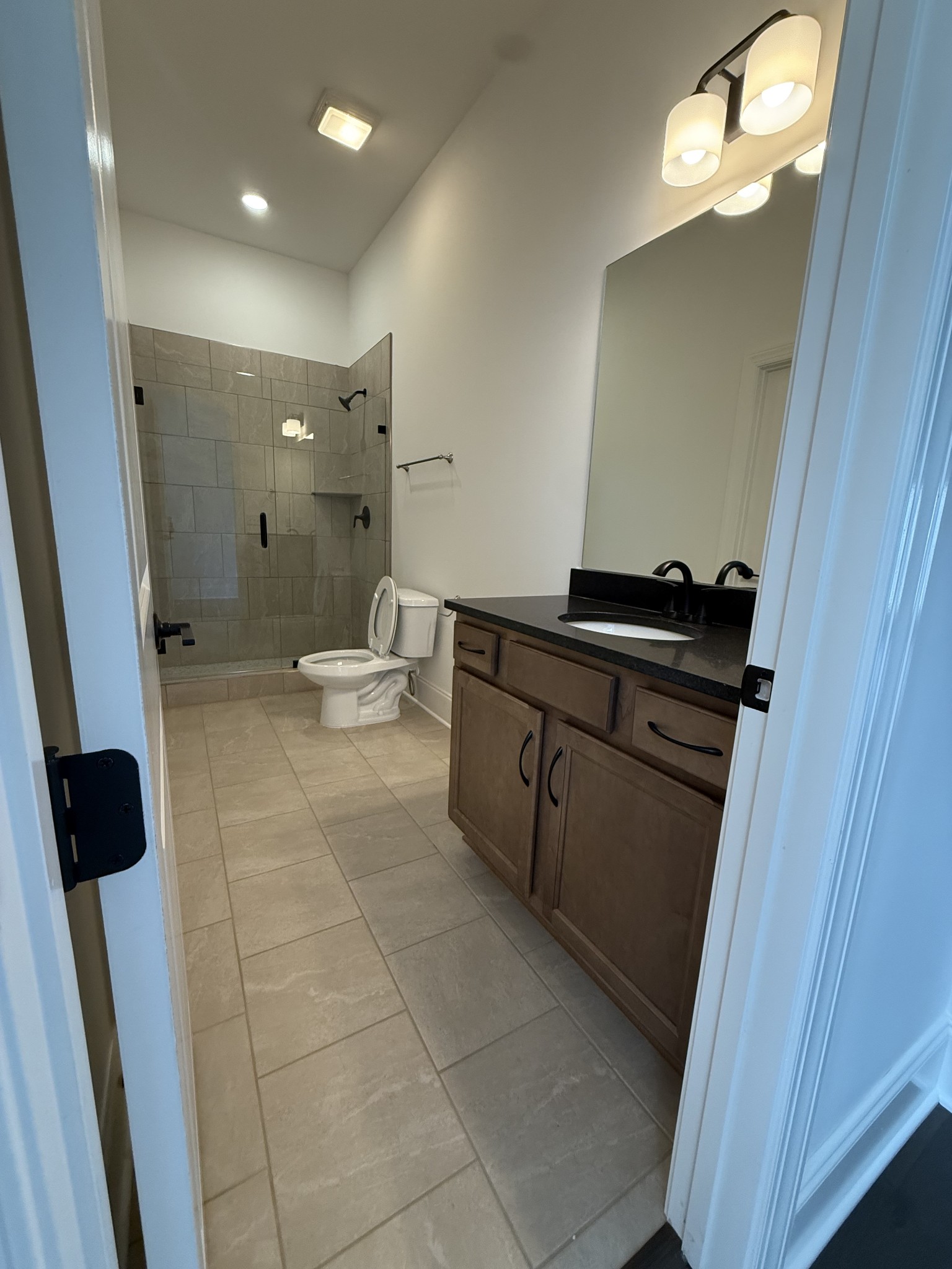 2115 Harkreader Road Mount Juliet, TN 37122 - Photo 10 of 21 a bathroom with a sink and a mirror