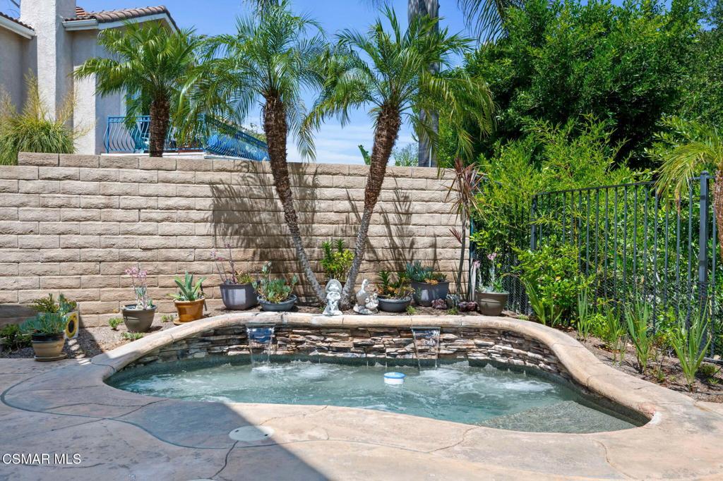 335 Kitetail Street Simi Valley, CA 93065 - Photo 21 of 55 a view of a swimming pool with a patio