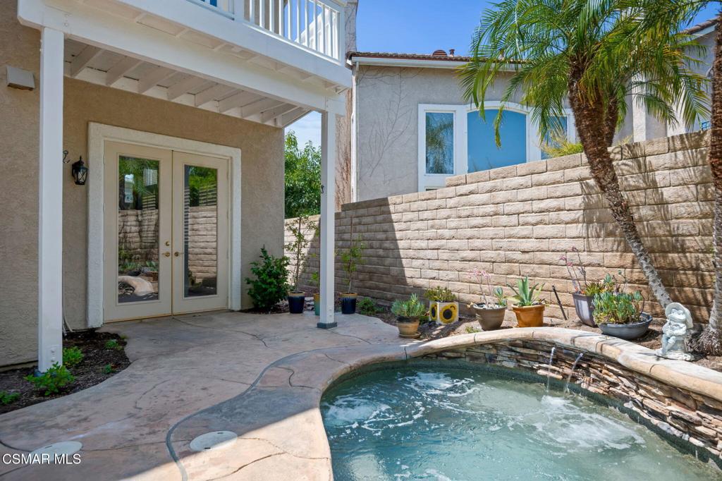 335 Kitetail Street Simi Valley, CA 93065 - Photo 23 of 55 a view of a house with backyard and sitting area