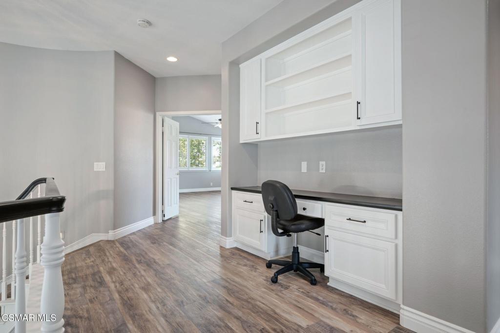 335 Kitetail Street Simi Valley, CA 93065 - Photo 26 of 55 a view of a workspace with furniture and a window