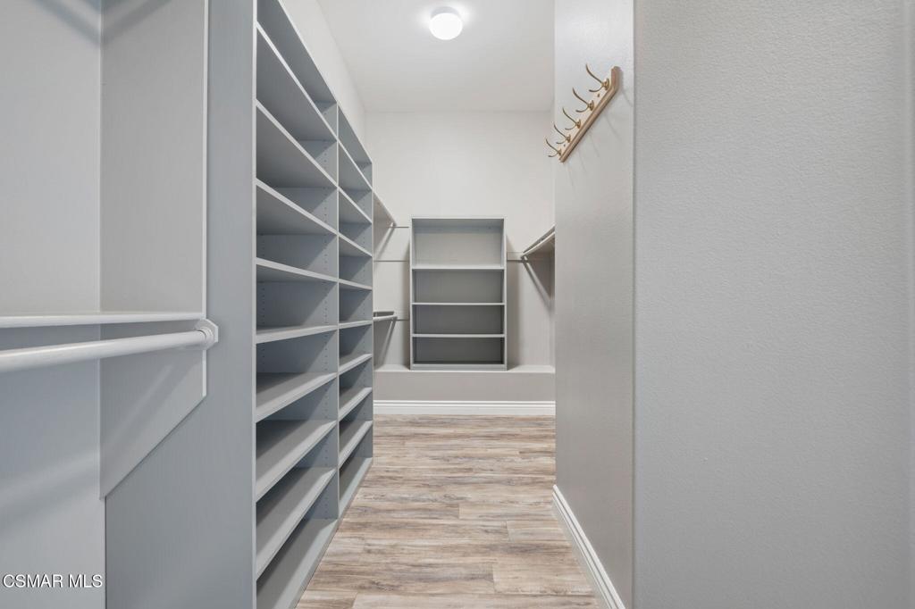 335 Kitetail Street Simi Valley, CA 93065 - Photo 35 of 55 a view of walk in closet with empty racks