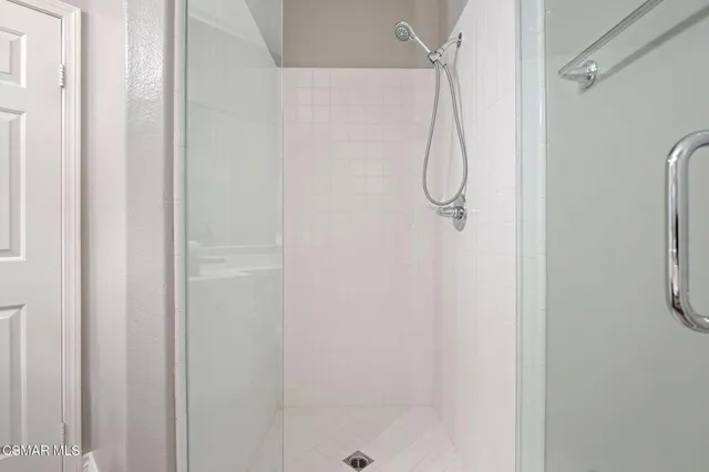 a view of a swimming pool with sitting area