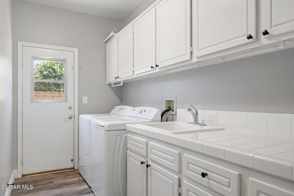 335 Kitetail Street Simi Valley, CA 93065 - Photo 45 of 55 a kitchen with appliances and cabinets