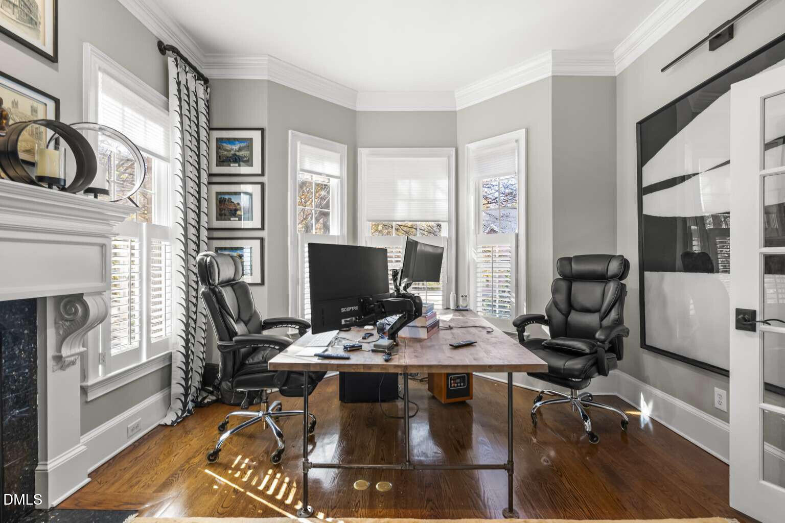 12452 Richmond Run Drive Raleigh, NC 27614 - Photo 11 of 73 a view of a workspace with furniture and a fireplace