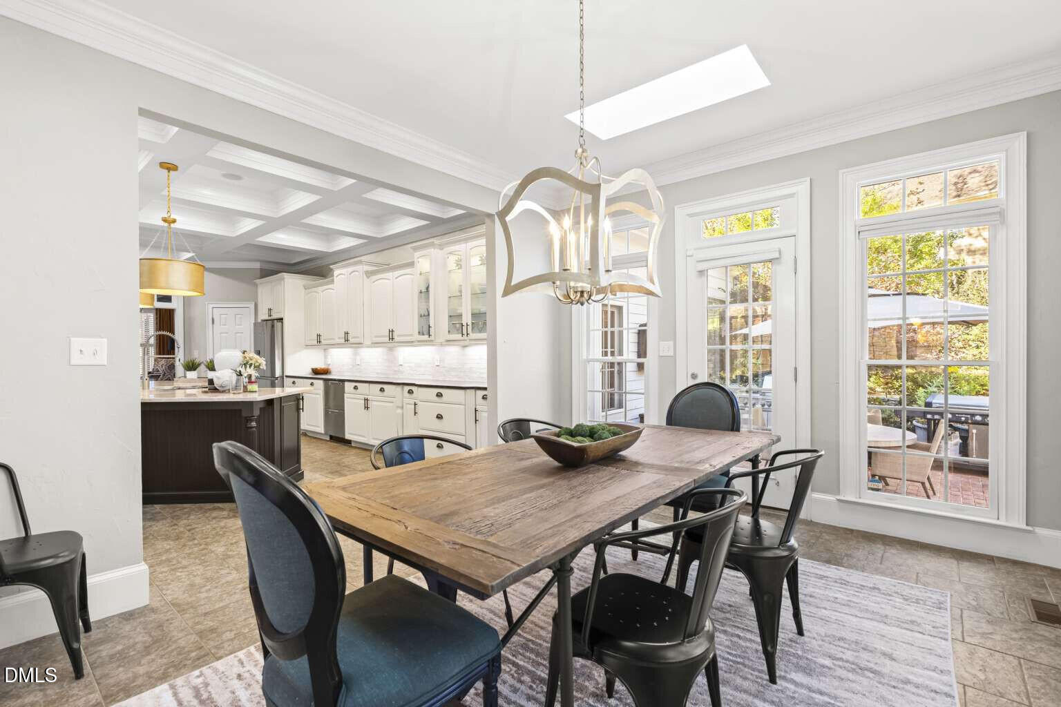 12452 Richmond Run Drive Raleigh, NC 27614 - Photo 22 of 73 a view of a dining room with furniture and wooden floor