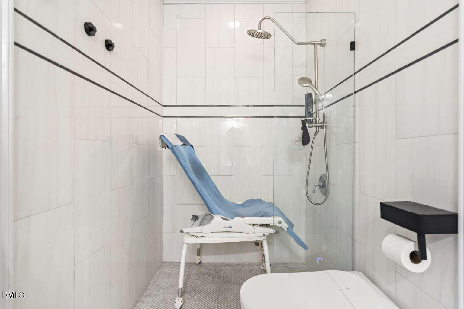 12452 Richmond Run Drive Raleigh, NC 27614 - Photo 50 of 73 a bathroom with a toilet and a shower