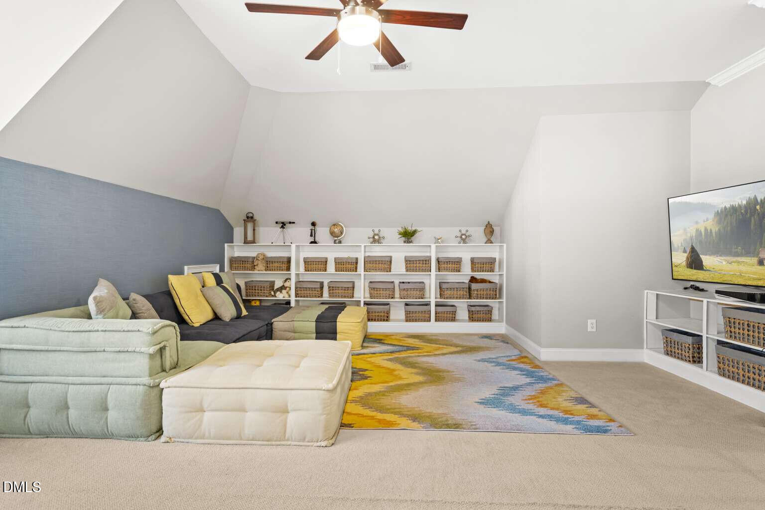 12452 Richmond Run Drive Raleigh, NC 27614 - Photo 52 of 73 a living room with furniture and flat screen tv