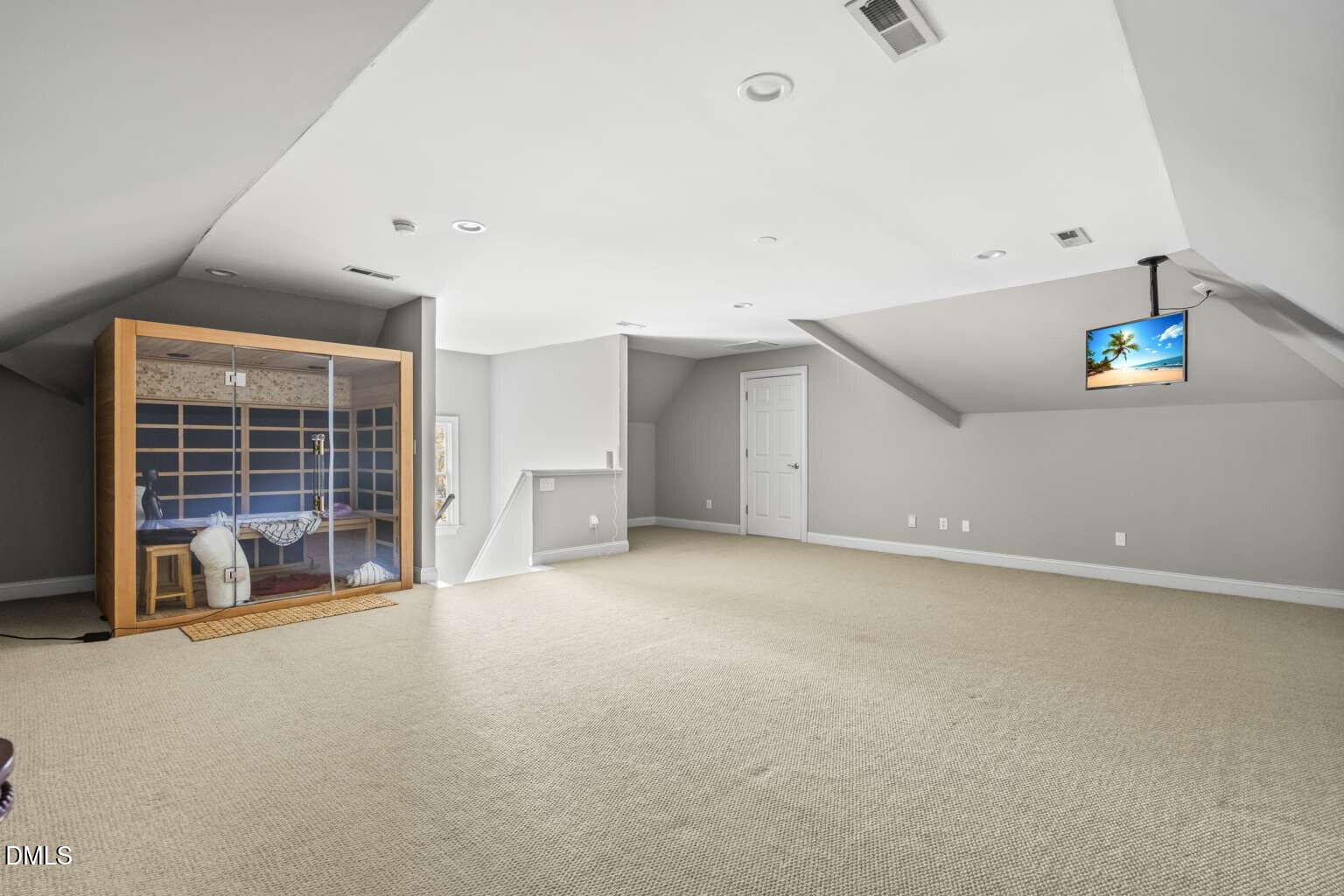12452 Richmond Run Drive Raleigh, NC 27614 - Photo 59 of 73 a view of an empty room with a fireplace and a window