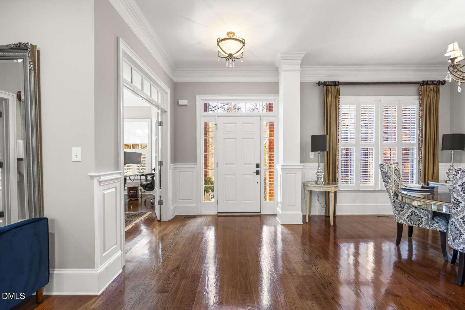 12452 Richmond Run Drive Raleigh, NC 27614 - Photo 6 of 73 an empty room with wooden floor and windows