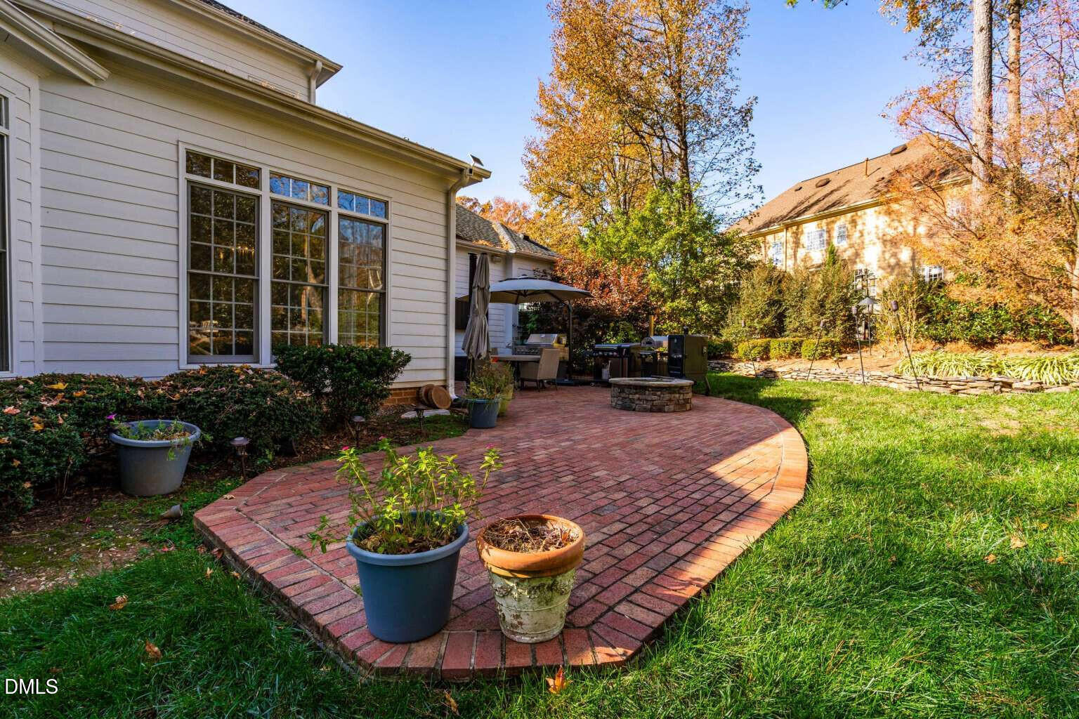 12452 Richmond Run Drive Raleigh, NC 27614 - Photo 63 of 73 a view of a backyard with sitting area and garden