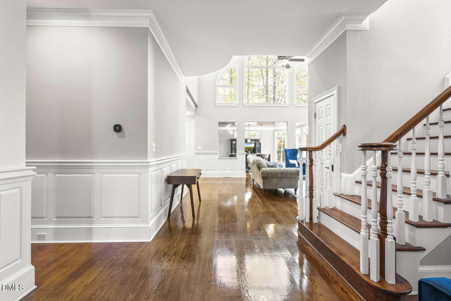 12452 Richmond Run Drive Raleigh, NC 27614 - Photo 8 of 73 a view of entryway and hall with wooden floor
