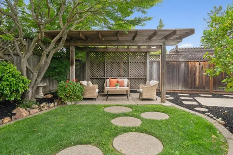 an aerial view of a house with a garden