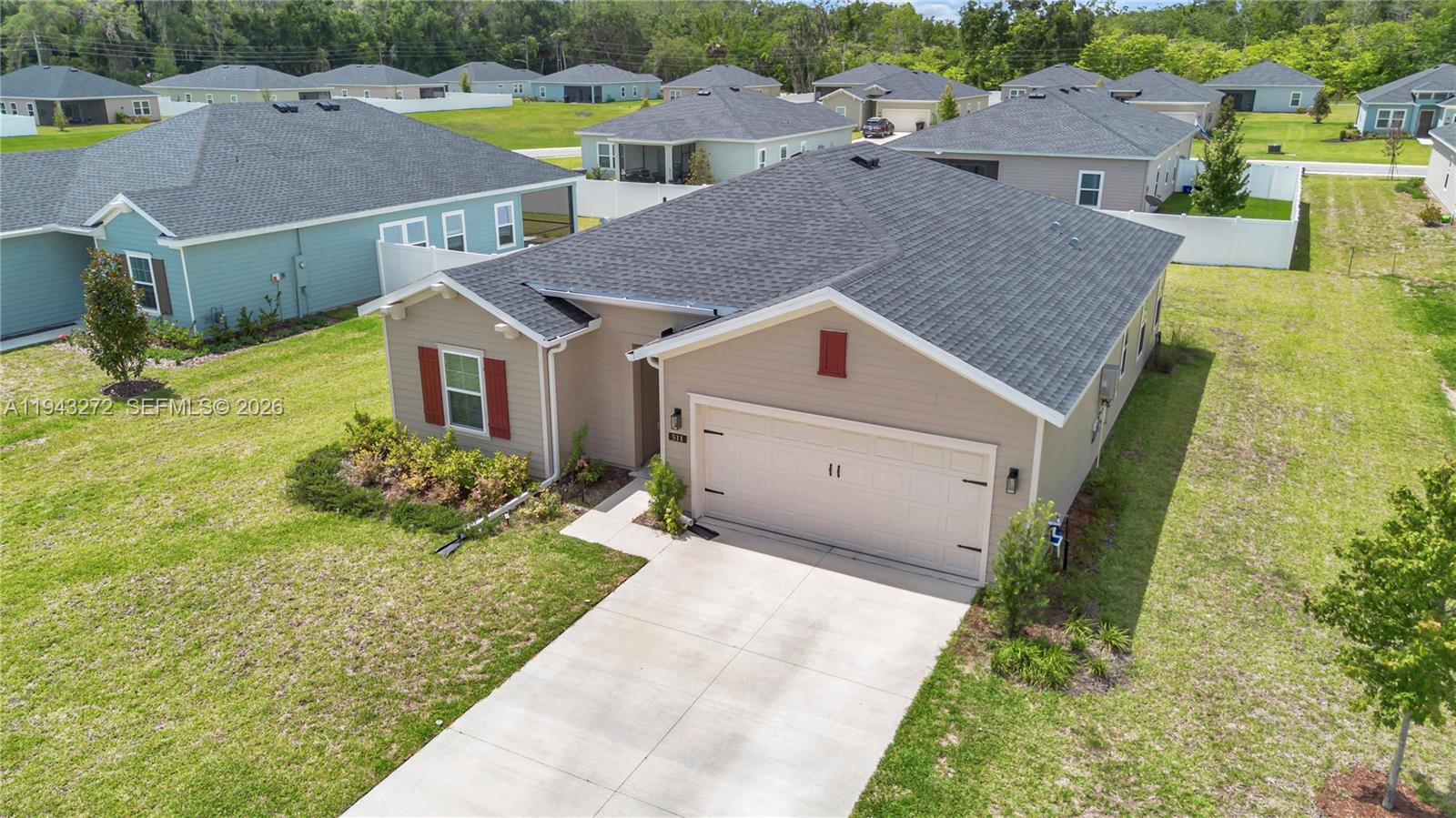 511 Southwest 5th Avenue Williston, FL 32696 - Photo 5 of 11 a aerial view of a house next to a yard