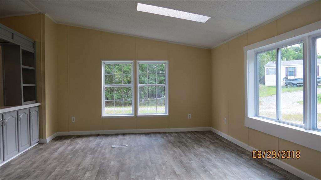 34 Winslow Road Naples, ME 04055 - Photo 10 of 29 Living area with a skylight.