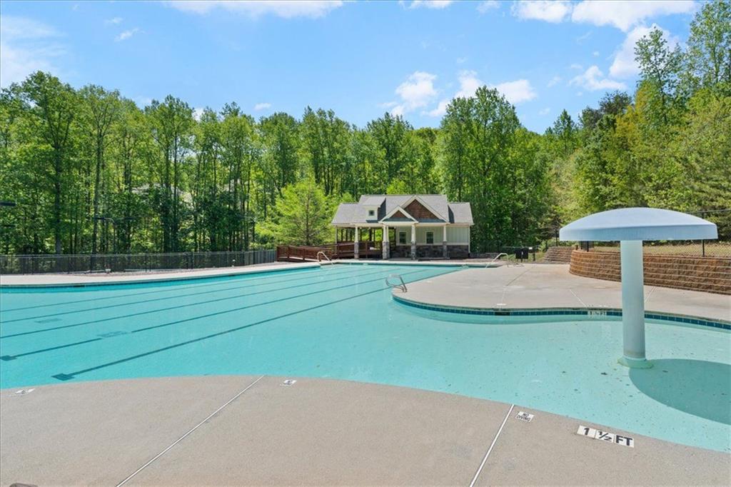 7610 Scenic Overlook Cumming, GA 30041 - Photo 49 of 62 a view of a house with backyard and trees