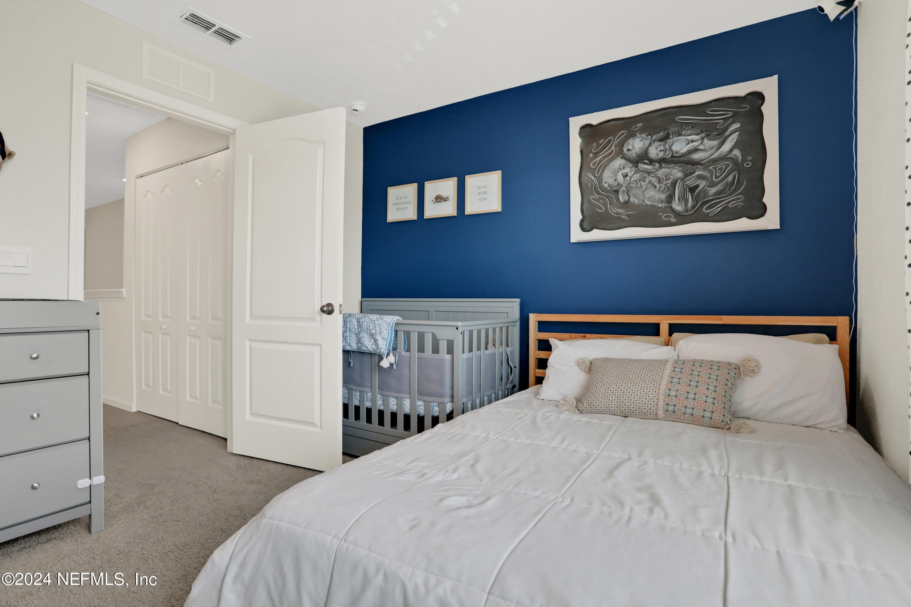 854 Rotary Road Jacksonville, FL 32211 - Photo 18 of 32 a bedroom with a bed and a closet