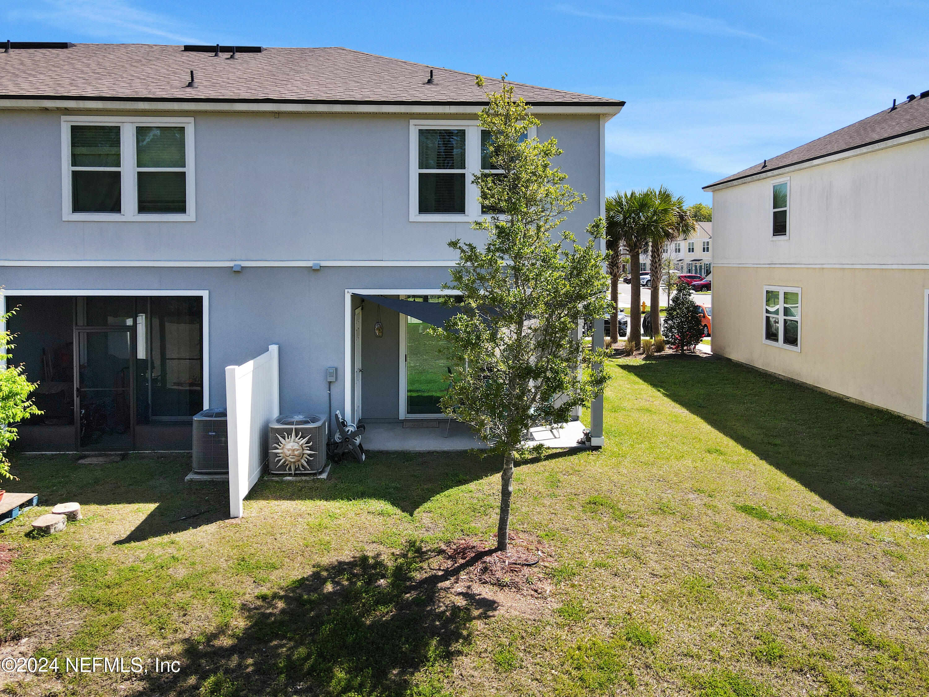 854 Rotary Road Jacksonville, FL 32211 - Photo 31 of 32 a view of a house with backyard and sitting area
