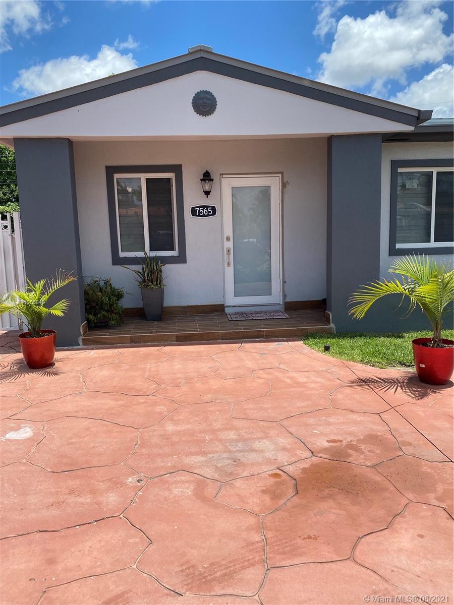 7565 Southwest 28th Street Road Miami, FL 33155 - Photo 1 of 31 a view of a house with a yard