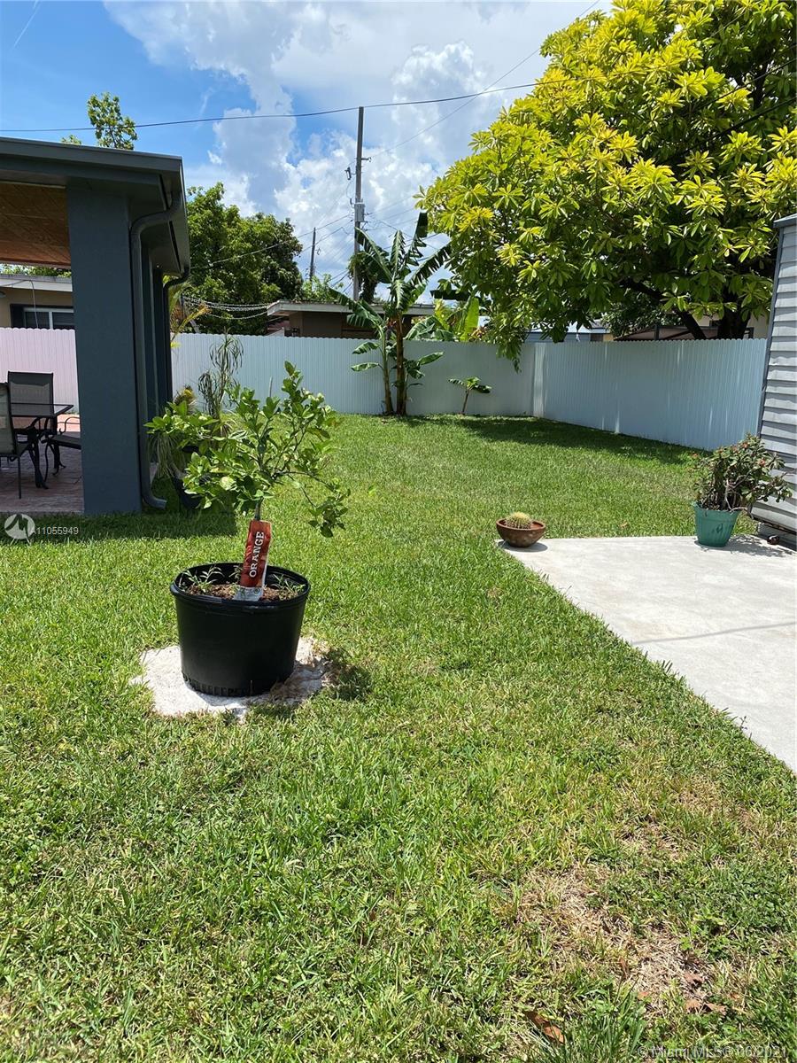 7565 Southwest 28th Street Road Miami, FL 33155 - Photo 13 of 31 a view of a backyard with potted plants
